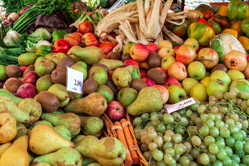 Different fruits on the stall at the market.