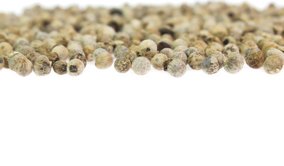 white peppers on the white background