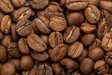 Coffee beans close-up background. Fresh roasted