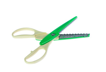 Zigzag scissors for arts isolated on white