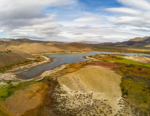 Audacious aerial Photography of the vibrant and  photogenic John Day Fossil Beds and the iridescent Painted Hills Reservoir of Wheeler County in Mitchell, Oregon