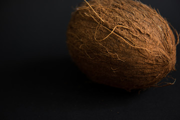 coconut on black background