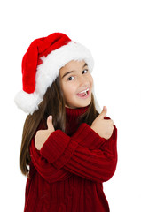 Portrait of happy little girl in Santa hat showing ok sign isolated on white background