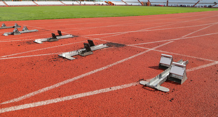Fototapeta premium Start on a treadmill in a stadium