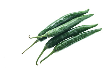 Green chilli peppers isolated on white