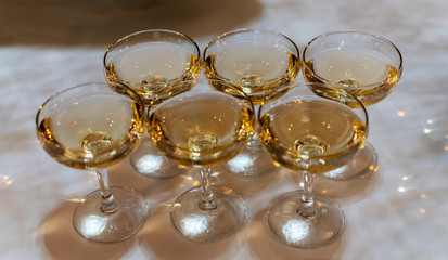 crystal glasses close-up with champagne on the wedding table. event concept