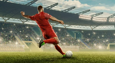 Foto op Canvas Soccer player in action. Run with a ball. Soccer stadium with cheering fans © TandemBranding