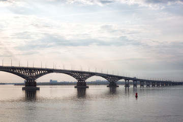 Fototapeta na wymiar Bridge over the river Volga. The bridge connects Saratov and Engels. Russia