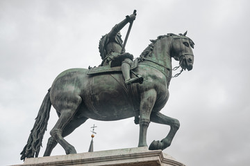 Fototapeta na wymiar Main square - Plaza Mayor in Madrid Spain. King Philip III Equestrian Statue .