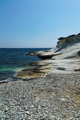 Beach on the sea with turquoise water and white cliffs