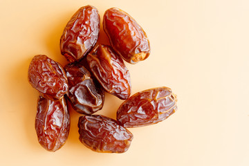 Dates close-up isolated on the table. Dried fruits, healthy and diet food