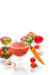 homemade hot adjika from tomatoes, hot and sweet peppers with spices