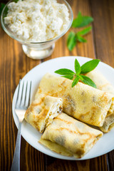 sweet fried thin pancakes with cottage cheese inside