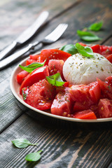 Juicy tomatoes, mozzarella and fresh basil. Caprese salad