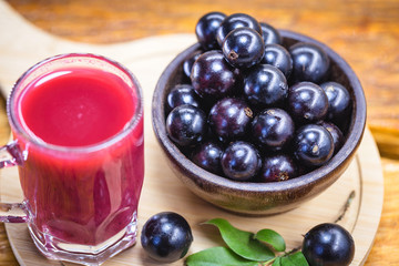 Jabuticaba juice, fruit also known as jaboticaba. Natural and organic juice, extracted directly from the fruit. Brazilian exotic fruit juice.