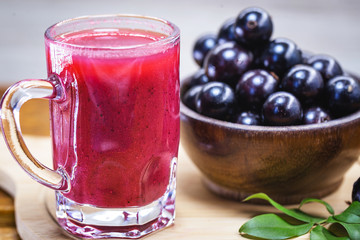 Jabuticaba juice, fruit also known as jaboticaba. Natural and organic juice, extracted directly from the fruit. Brazilian exotic fruit juice.