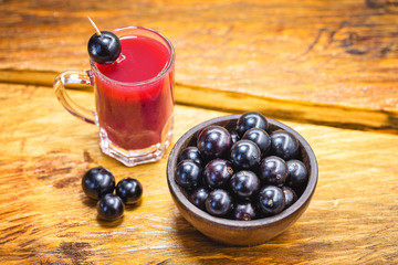 Jabuticaba juice, fruit also known as jaboticaba. Natural and organic juice, extracted directly from the fruit. Brazilian exotic fruit juice.