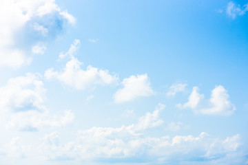 Nature Bright blue Sky with white clouds on blackground. Beautiful sky and clouds in the afternoon.