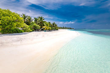Perfect tranquil beach scene, soft sunlight and white sand and blue endless sea as tropical landscape. Luxury resort hotel, vacation and holiday landscape
