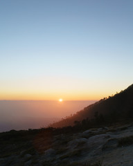 Amazing orange Sunrise on on the mountain  Ijen  Java ,Indonesia.