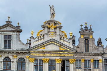 Fototapeta na wymiar Facades of rooftops of medieval building on Grand Place in Brussels, Belgium