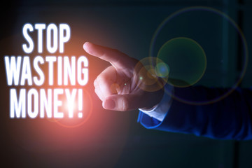 Word writing text Stop Wasting Money. Business photo showcasing advicing demonstrating or group to start saving and use it wisely Isolated hand pointing with finger. Business concept pointing finger