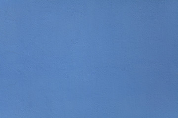 Blue wall, texture, background. The building wall, painted with water-based paint. Smooth (flat) surface in blue color - obrazy, fototapety, plakaty
