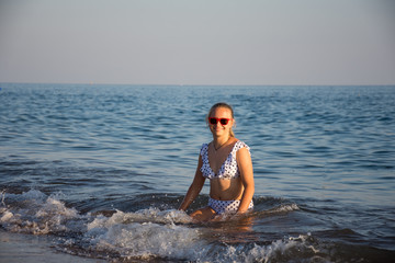 Teenager girl  posing at the beach