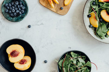 Background for cooking with fruits, berries and salad. Kitchen background, flatlay