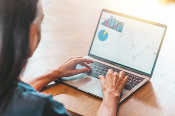 Concentration. Businesswoman using laptop in the office