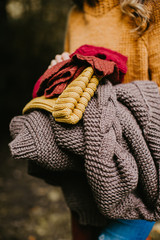  Knitwear in autumn color. Autumn background from knitted clothes.