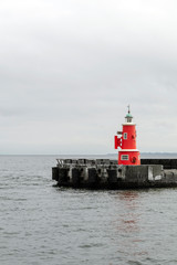 Fototapeta premium Mole lighthouses are familiar to travelers on Scandlines ferries crossing between Helsingør and Helsingborg, Sweden