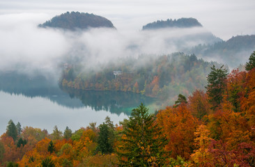 Amazing view of Lake Bled at foggy autumn morning