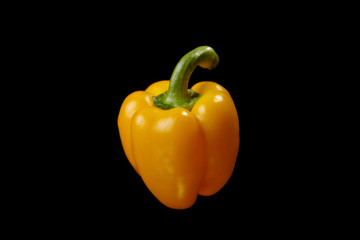 fresh salad pepper vegetable on a black background