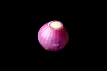 fresh onions on a black background