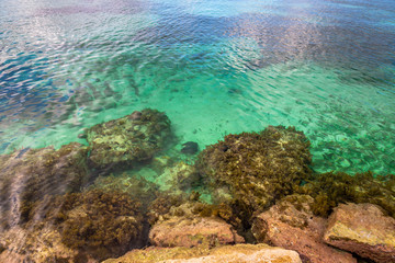 Jamaican Coastal View. Exposure done by the water of the clean and pristine green and blue water of the caribbean.