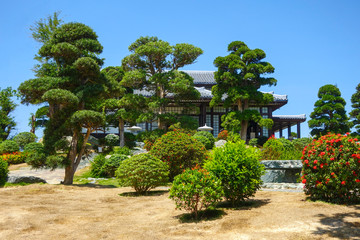 Japanese garden with asian style house, beatiful landscape and blue sky in dendra park in Vietnam