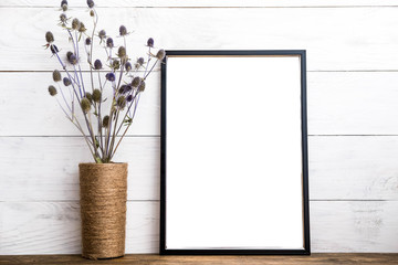 Black picture frame with decor
