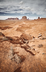 Retro stylized picture of Monument Valley arid scenery, USA