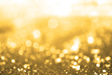 Golden bokeh abstract background.