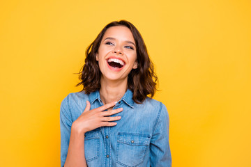 You are so funny. Portrait of cheerful positive funny funky girl hear joke laugh wear youth clothses isolated over yellow bright color background - obrazy, fototapety, plakaty