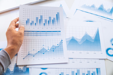 businessman working data document graph chart report marketing research development  planning management strategy analysis financial accounting. Business  office concept.