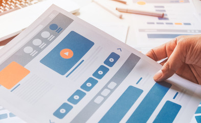 Website designer Creative planning application developer development draft sketch drawing template layout prototype framework wireframe design studio . User experience concept .