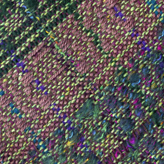 Fototapeta premium Close-up of handwoven woolen fabric with pattern