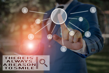 Text sign showing There Is Always A Reason To Smile. Business photo text Positive thinking good attitude energy Male human wear formal work suit presenting presentation using smart device