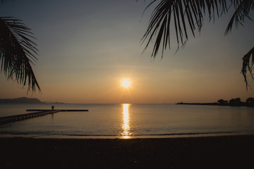 Fototapeta na wymiar Beautiful sunset over the ocean. Sunrise in the sea