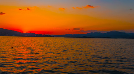 Fototapeta premium Seascape dawn over sea shore landscape paradise evening