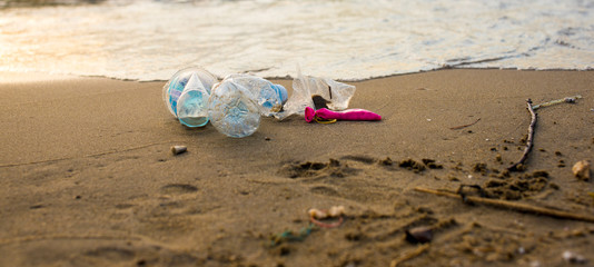 Fototapeta na wymiar Plastic waste on beaches shows environmental pollution 
