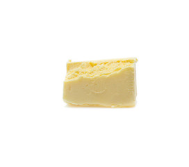 Pieces of butter isolated on white background