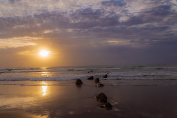 a sunset on Barrika beach in Biscay
